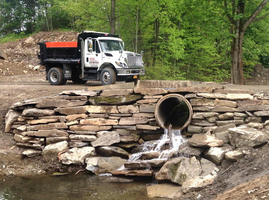 drainage pipe in rock wall